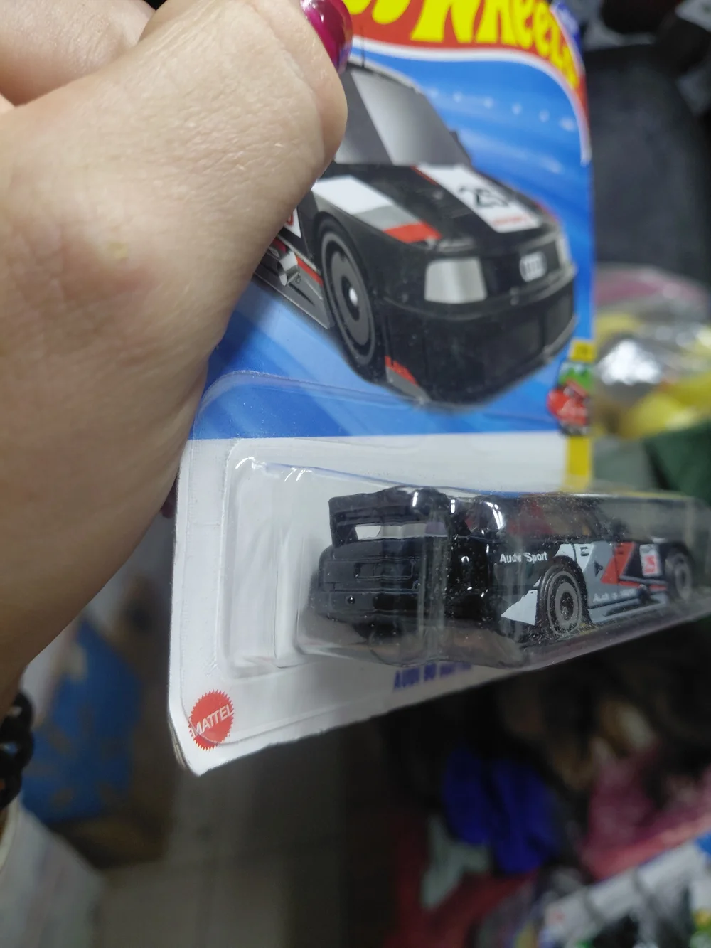 the Hot Wheels Audi 90 Quattro in black, numbered 199/250